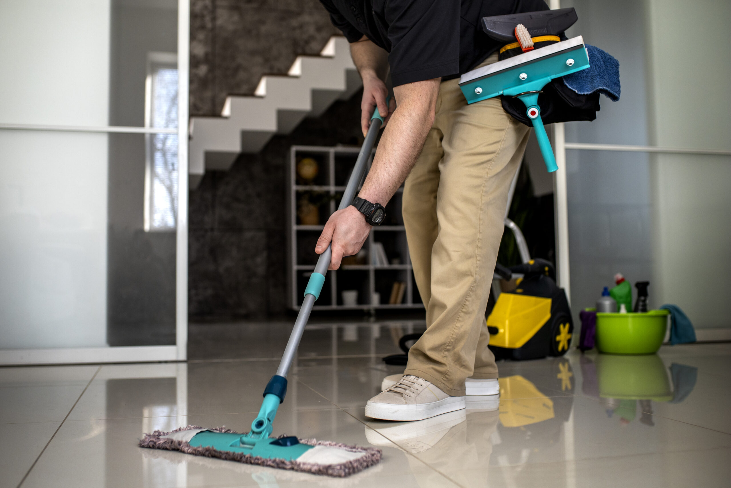 man doing professional home cleaning service
